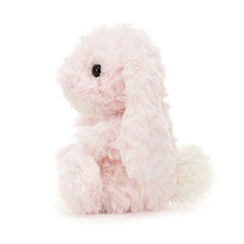 Small light pink bunny soft toy with white tail