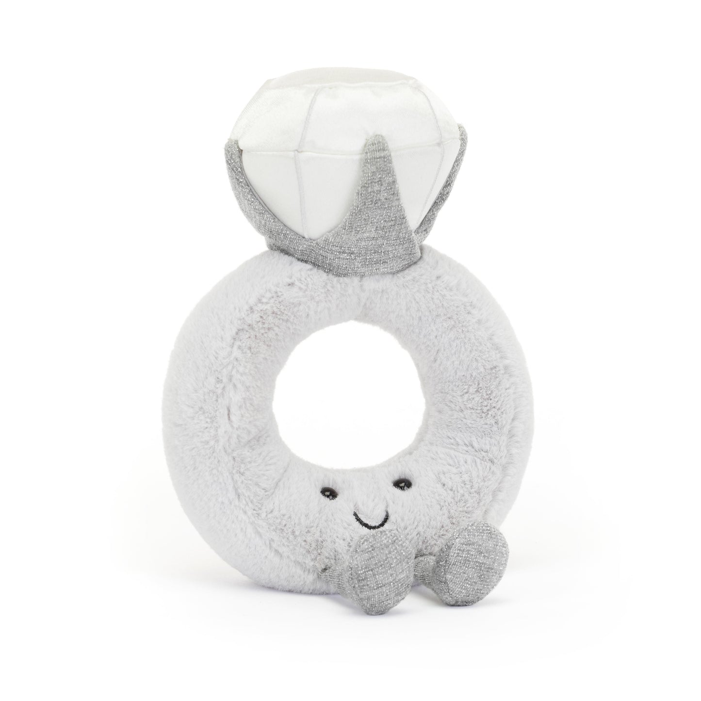 A gray plush toy in the shape of a ring with a diamond-shaped face and a smile.