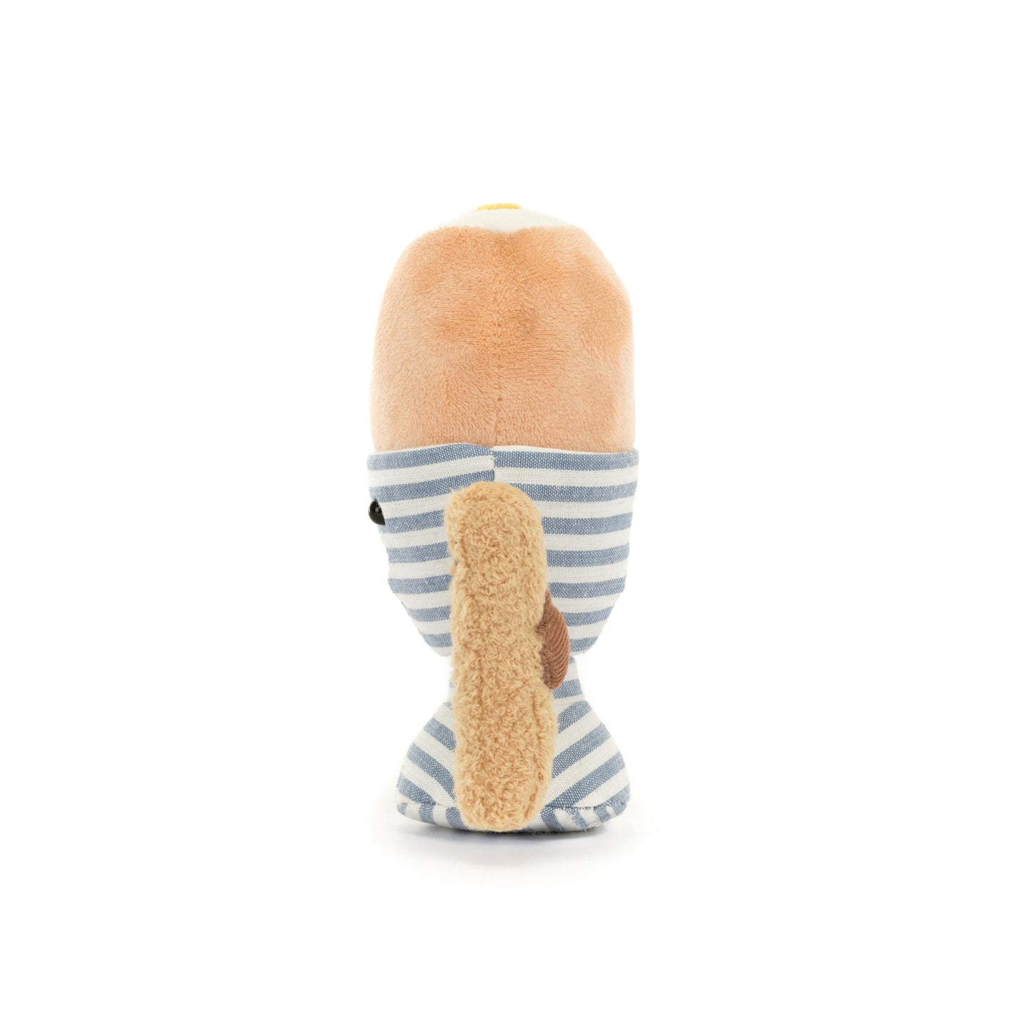 A soft toy resembling a dippy egg in a blue and white stripe egg cup with a brown toast soldier.