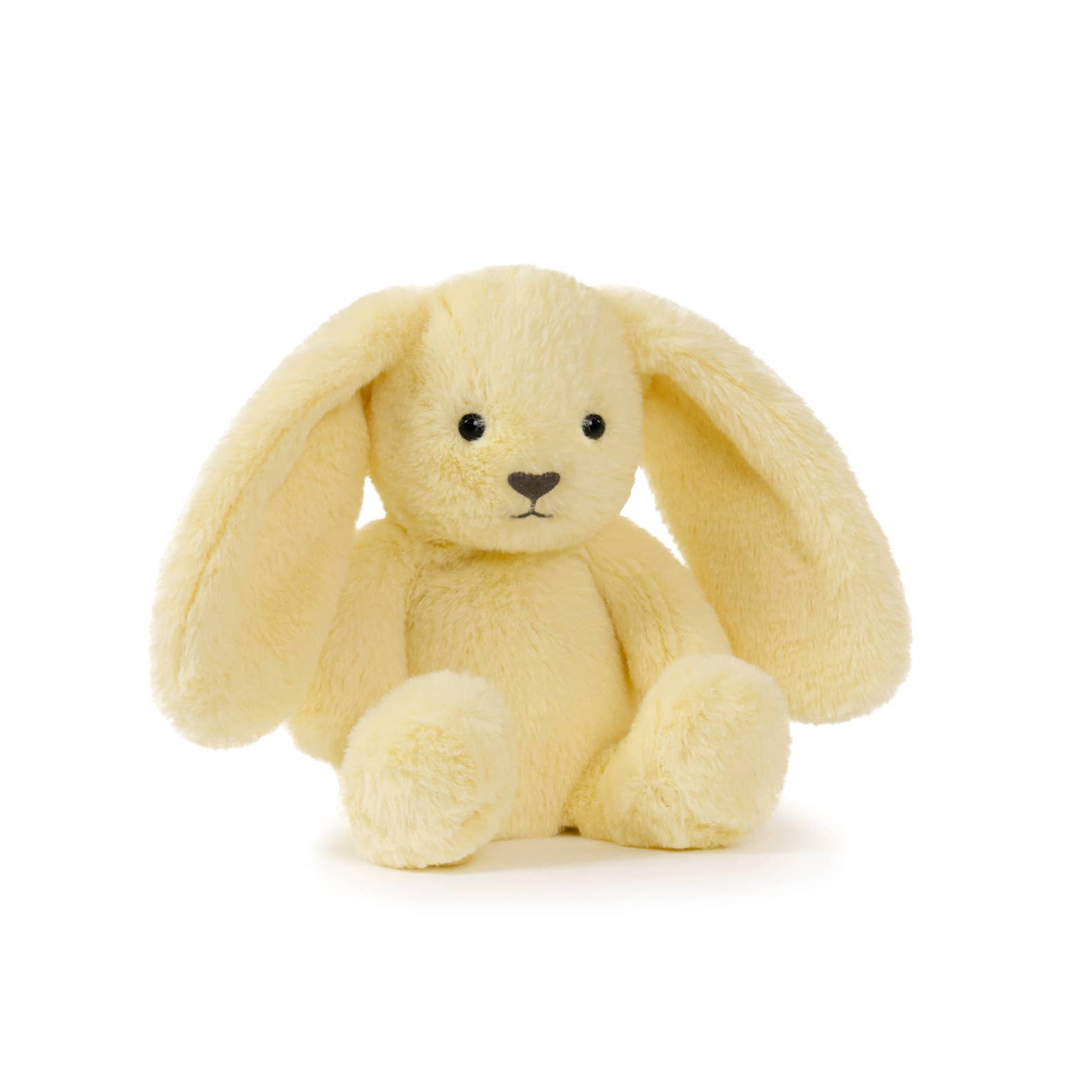 Yellow plush bunny toy on a white background