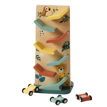 A wooden racing slide playset with jungle character decorations and three small toy cars.