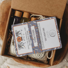 Box of childs magic potion products with labels on a wooden surface