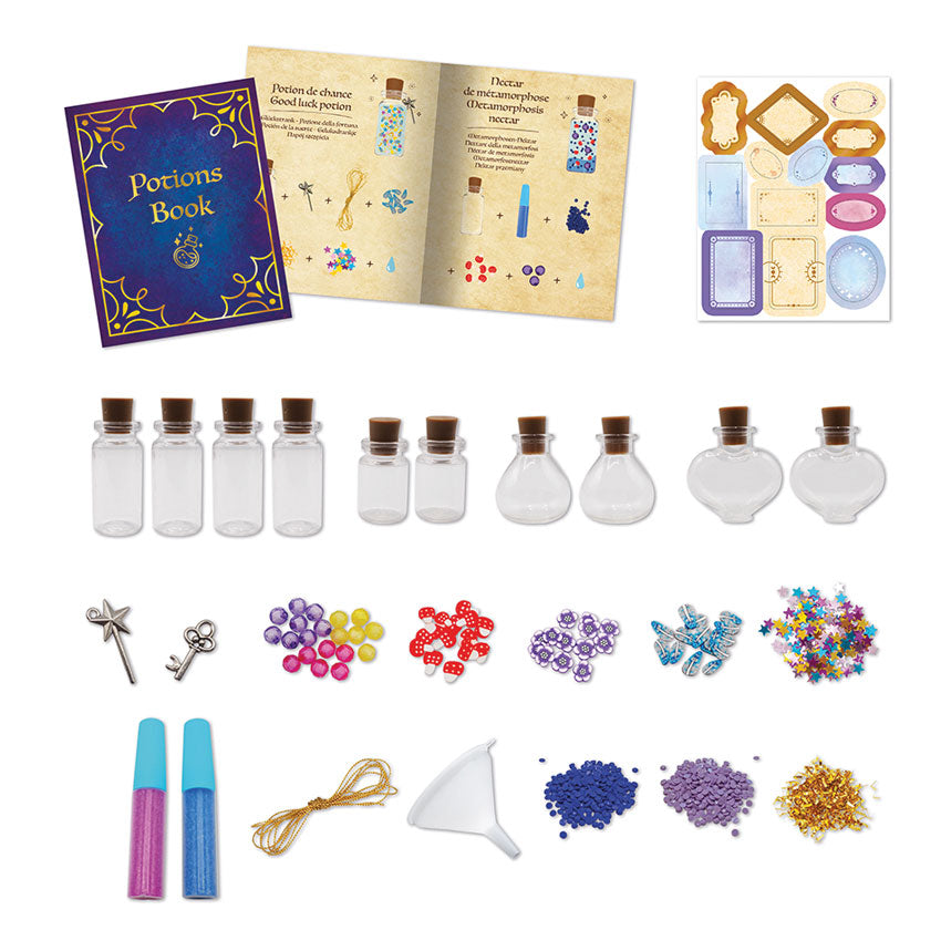 Contents of the Janod Magic School Potions Kit, including vials, decorations and a recipe book