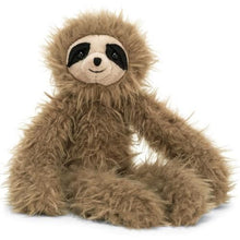 A plush toy representing a brown sloth with a soft, scruffy texture. The toy has a gentle facial expression with dark patches around the eyes, long arms and legs, and is seated against a plain background.