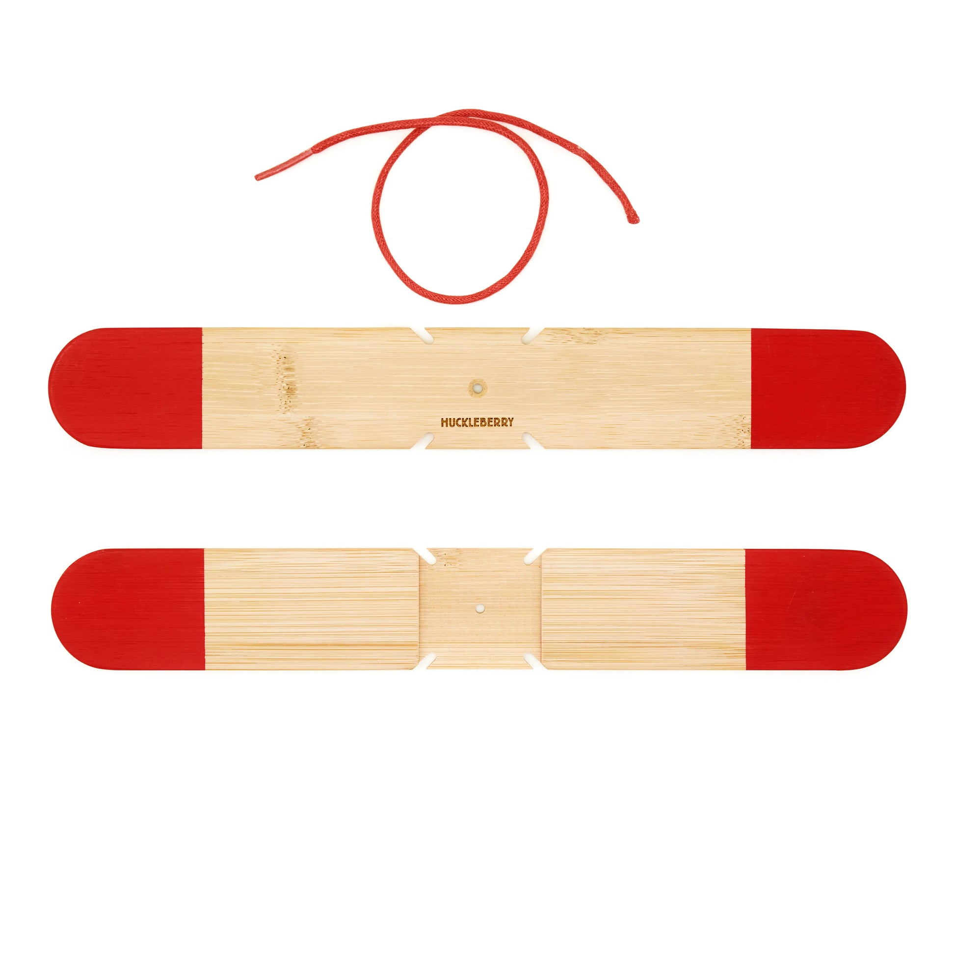 Two boomerang natural wood pieces with red ends on a white background
