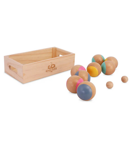 wooden crate stamped with Kinderfeets and wooden boules game pieces