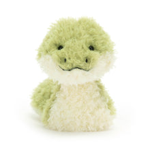 A plush toy resembling a green snake with a cream underbelly and a stitched smile.