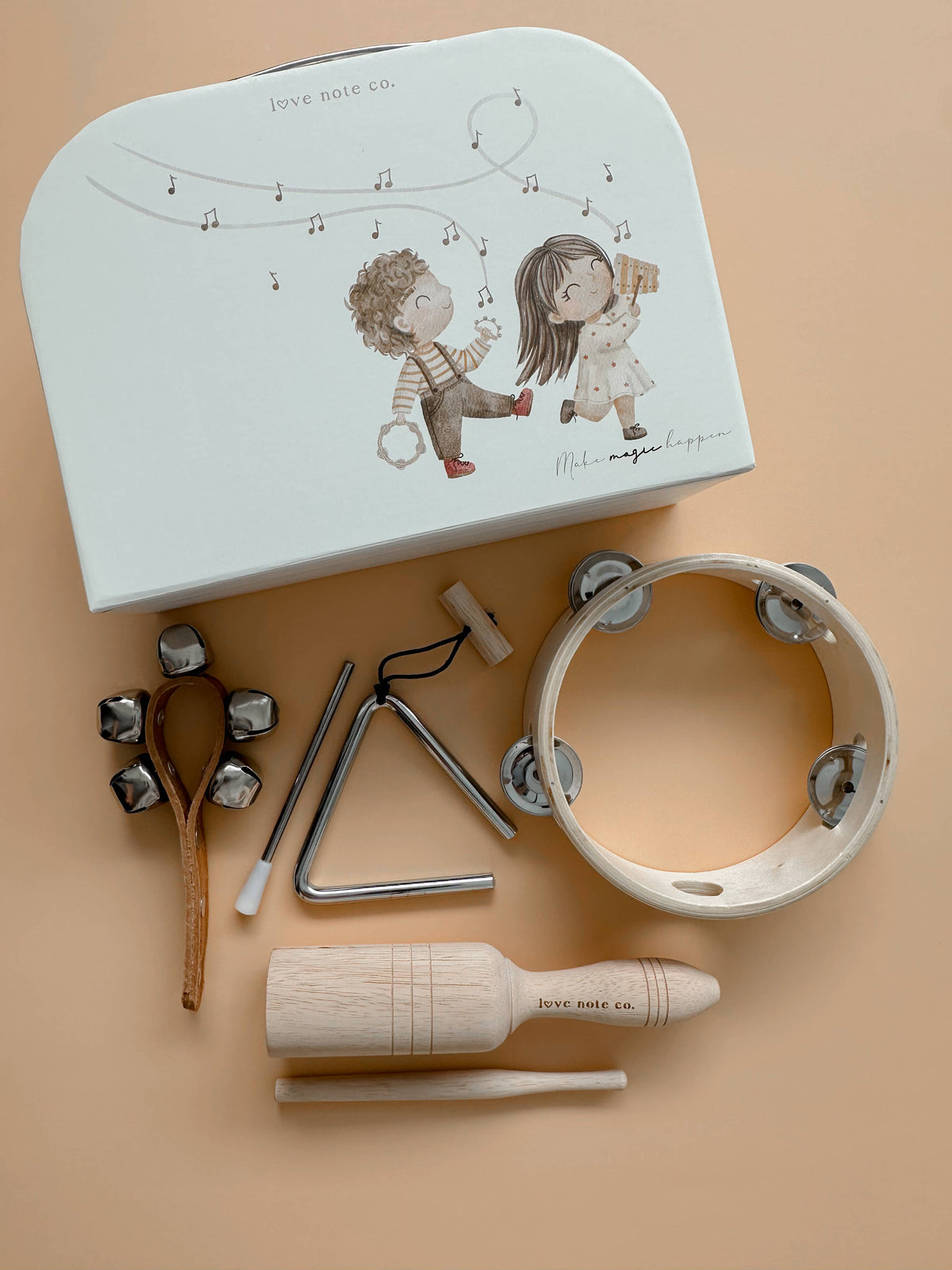 Love Note Co Little Sounds Music Set displayed in its illustrated white storage case.