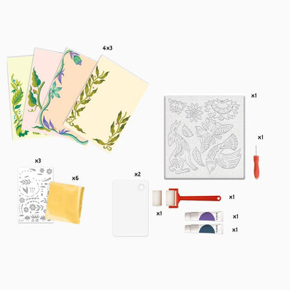 Set of stencils and painting tools with floral designs on a white background