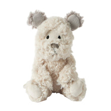 Plush toy dog with gray ears on a white background