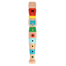 A colorful wooden recorder toy with animal face details and various holes for sound production.