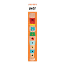 A cardboard retail box printed with a picture of a wooden recorder toy with animal face details and various holes for sound production.