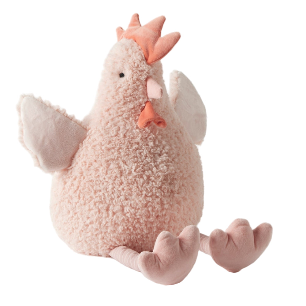 Large pink Plush toy chicken on a light  background