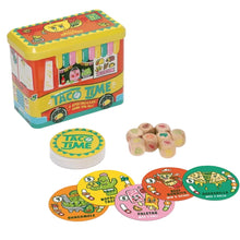 Colorful 'Taco Time' game set with toy truck and game pieces on a white background
