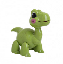 Child's small green plastic brontosaurus figure with large eyes and friendly expression.