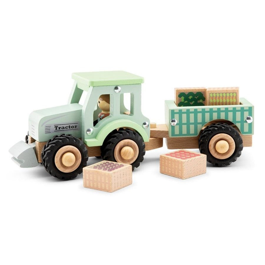Wooden toy tractor with blocks on a white background