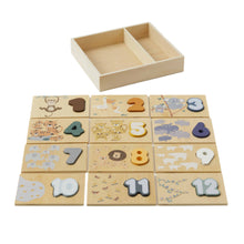 A wooden number sorter puzzle with numbers 0 to 9 and corresponding animal pictures.