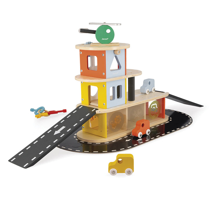 Kids wooden garage playset with roadway and vehicles, Janod brand at Send A Toy