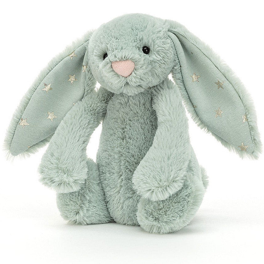 A medium-sized green plush toy rabbit with stars on its ears.