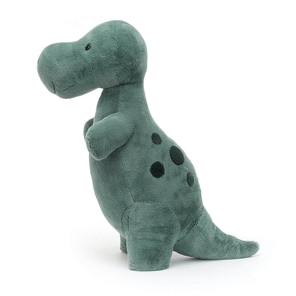 A plush toy resembling a T-Rex with a mossy green color, short squishy paws, a podgy tummy, and a squidgy tail.