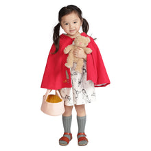 Girl wearing red cape holding Moppettes Bea Bear Set