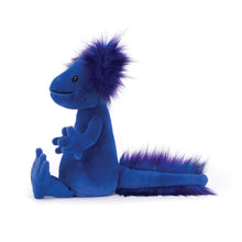 A plush toy resembling an axolotl with blue body and purple, green, and indigo tufts of fur.