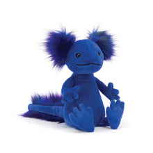 A plush toy resembling an axolotl with blue body and purple, green, and indigo tufts of fur.
