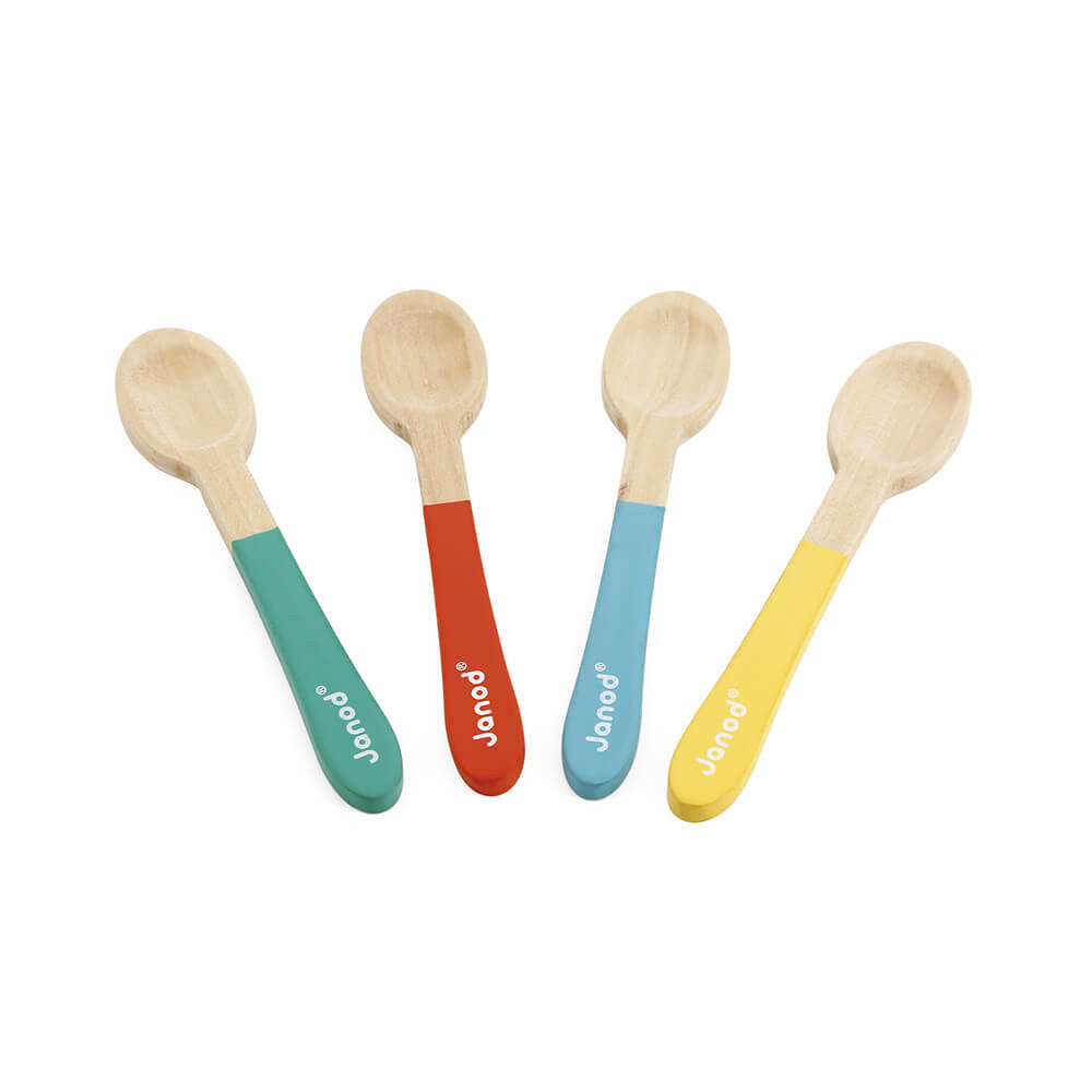 Red, blue, green and yellow wooden spoons on a white background. Spoons are printed with the word Janod.