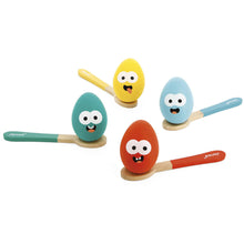 A set of colorful wooden eggs with cartoon faces on them, attached to spoons, intended for the egg and spoon race game.