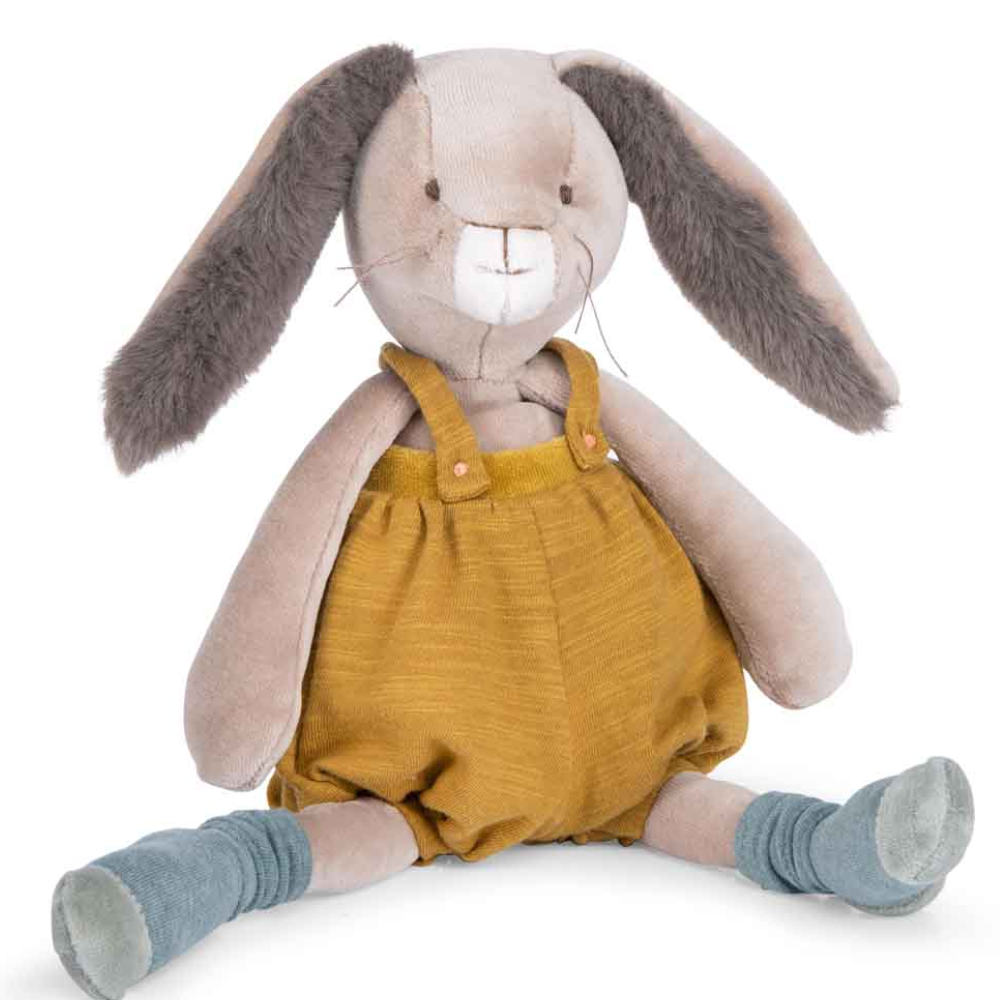 Trois Petits Lapins Ochre Rabbit soft toy with long fluffy ears, wearing ochre colour overalls and light blue socks - Moulin Roty toys retailed at Send A Toy 