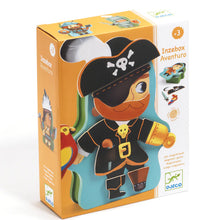 A colorful metal box packaging for a Djeco children's toy, the Magnetic Adventure Dressing Game, featuring a pirate character and various magnetic pieces.
