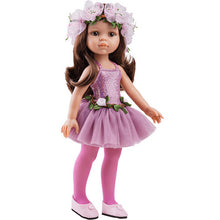 A vinyl doll depicting a ballerina in a purple tutu with a floral headband, pink tights, and pink ballet shoes.
