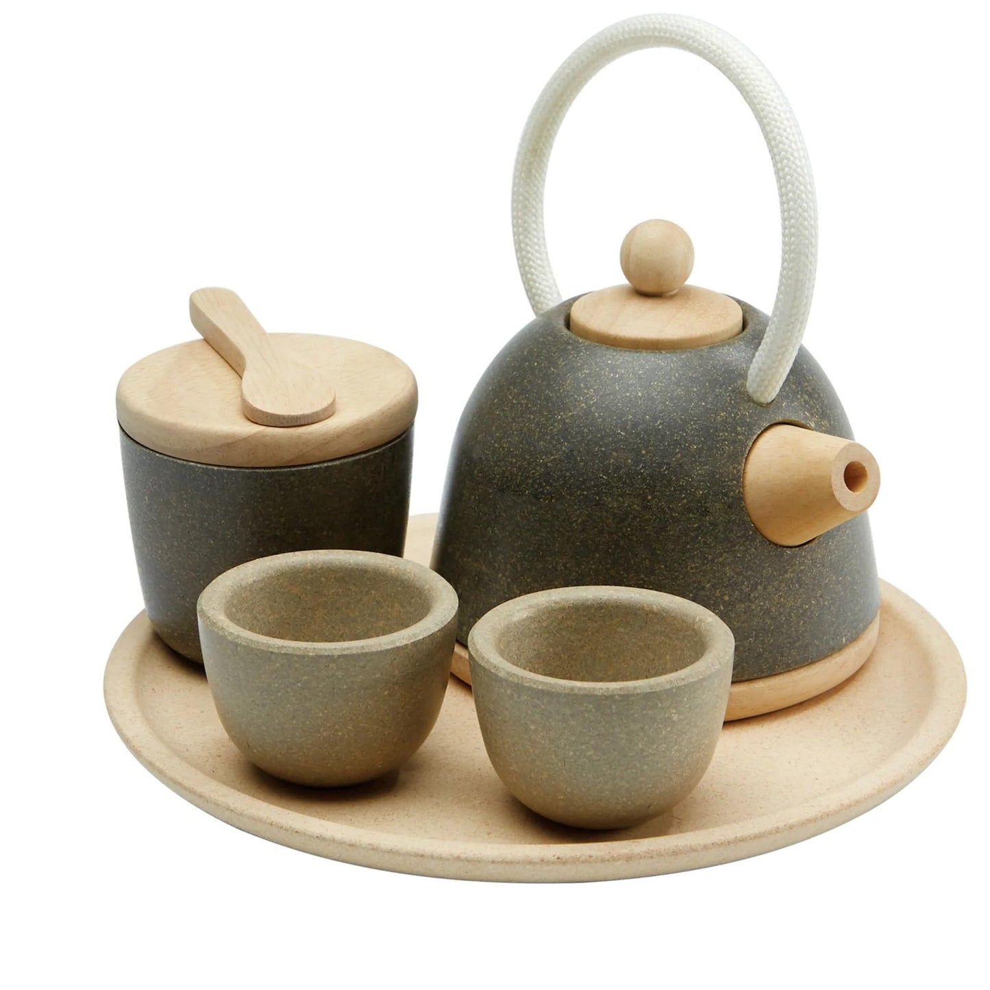 An Oriental Tea Set including a teapot, two cups, pitcher, tray, and caddy spoon, all made of wood and presented on a white background.