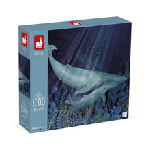A puzzle box with an illustration of a whale and its calf in a blue-toned oceanic scene, indicating a 1000-piece jigsaw puzzle.