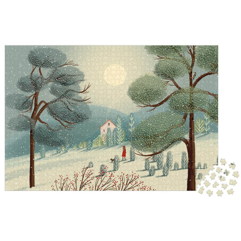 Almost completed puzzle depicting a girl in a red coat walking through a winter forest scene, on a white background.