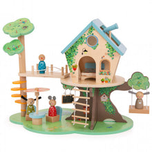 Wooden tree house doll house with assorted doll figures